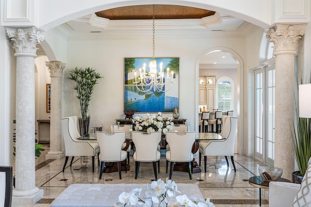 dining room featuring arched walkways, a notable chandelier, crown molding, a tray ceiling, and marble finish floor