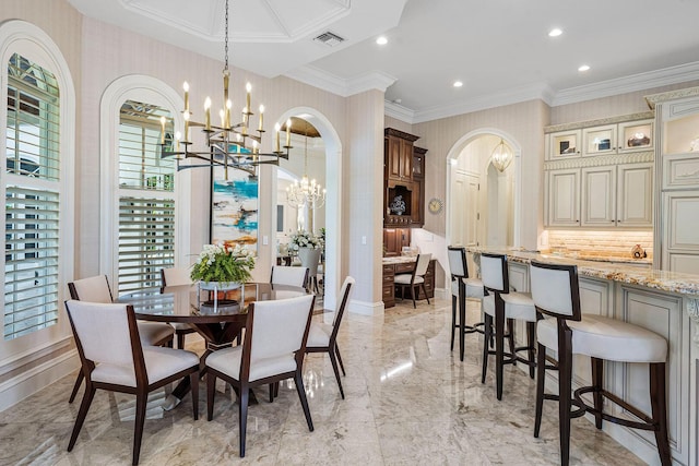 dining room with arched walkways, baseboards, an inviting chandelier, and ornamental molding