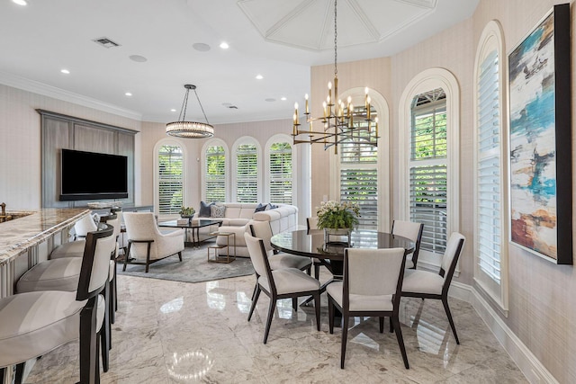 dining area with visible vents, baseboards, ornamental molding, a chandelier, and marble finish floor