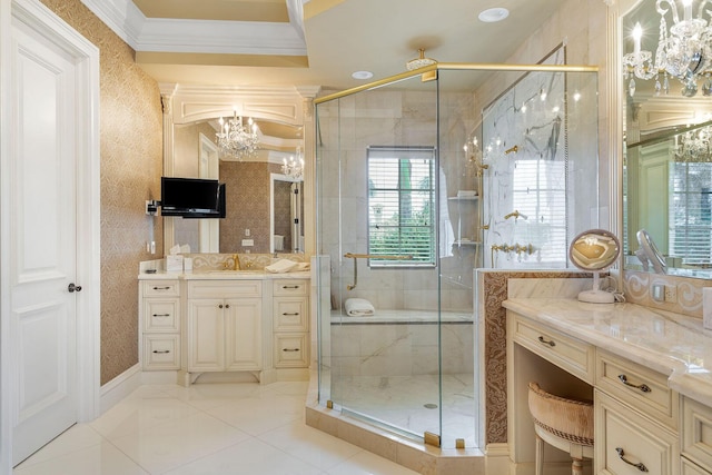 full bathroom featuring vanity, a stall shower, an inviting chandelier, and crown molding