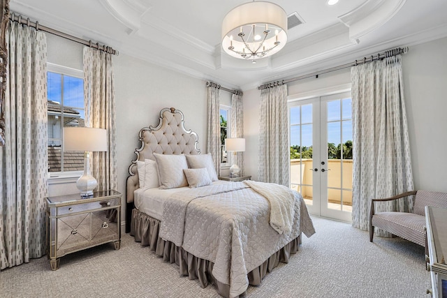 carpeted bedroom featuring ornamental molding, french doors, access to outside, and multiple windows
