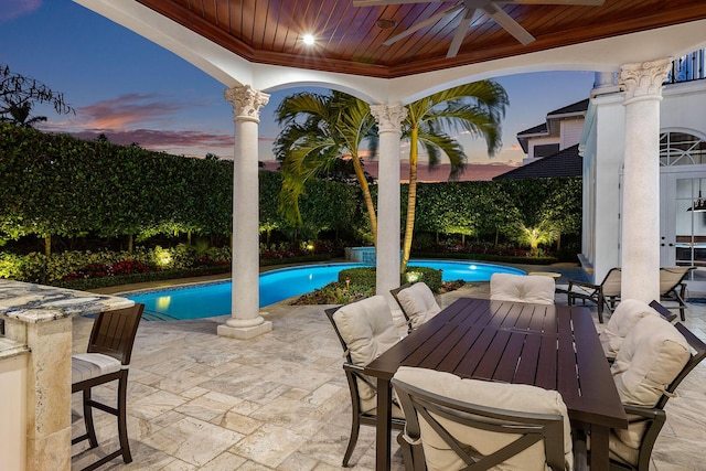 view of pool featuring outdoor dining space, a patio, a fenced in pool, and ceiling fan