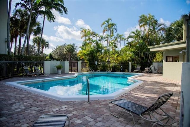 view of pool featuring a patio