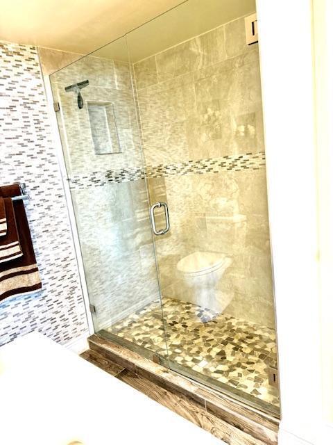 bathroom with walk in shower