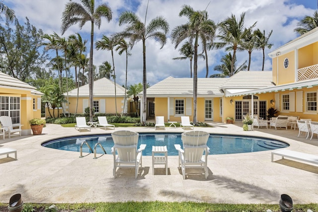 view of swimming pool featuring a patio area