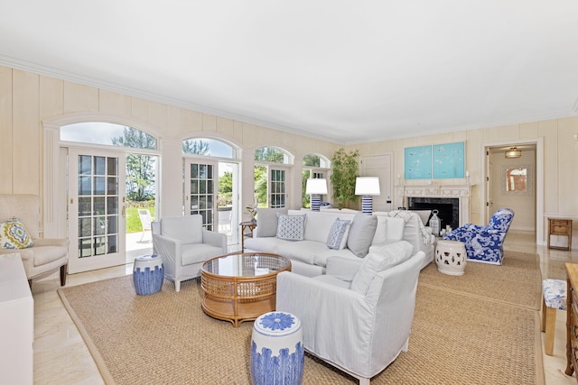 tiled living room featuring crown molding