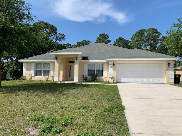 single story home featuring a front yard and a garage