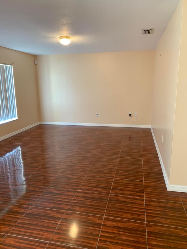 view of tiled spare room