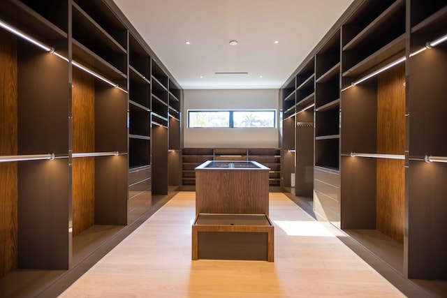 walk in closet featuring light wood-type flooring