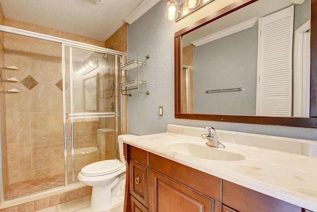 bathroom featuring vanity, toilet, a shower with shower door, and ornamental molding