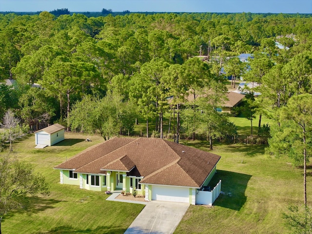 aerial view featuring a forest view