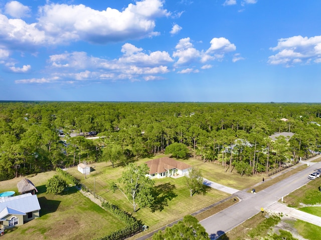 aerial view featuring a forest view