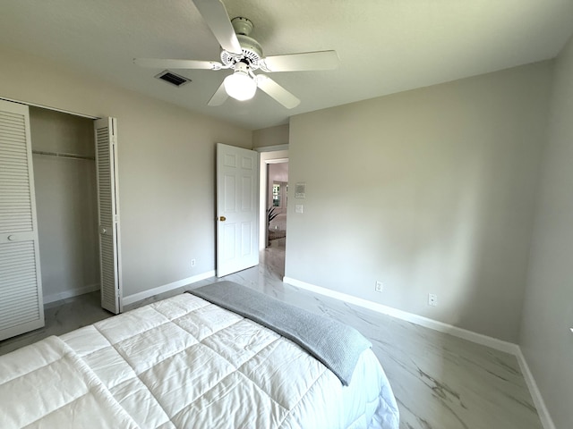 unfurnished bedroom featuring visible vents, baseboards, marble finish floor, and a closet