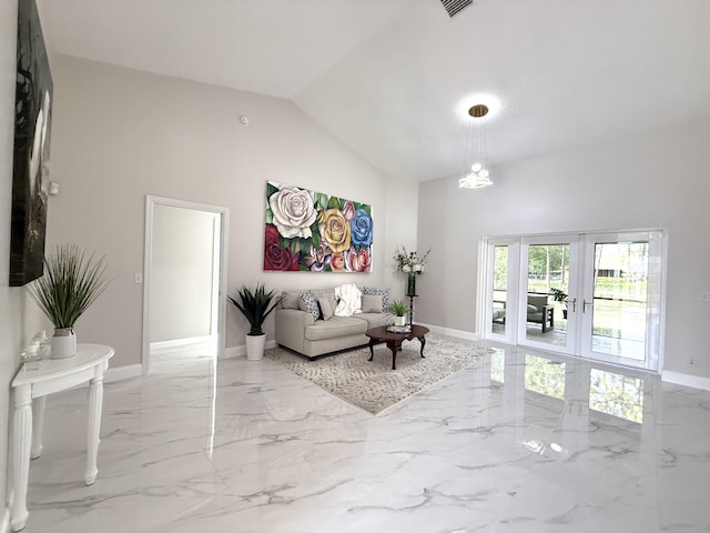 living area with baseboards, marble finish floor, french doors, and high vaulted ceiling