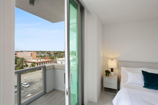 bedroom featuring floor to ceiling windows