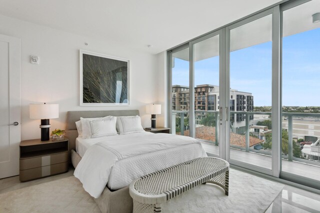 bedroom featuring light tile floors and sink