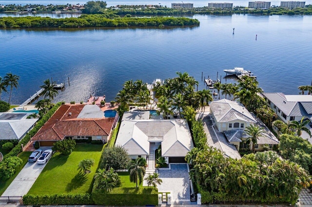 birds eye view of property featuring a water view