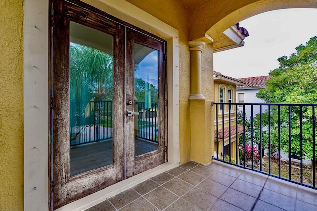 balcony featuring french doors