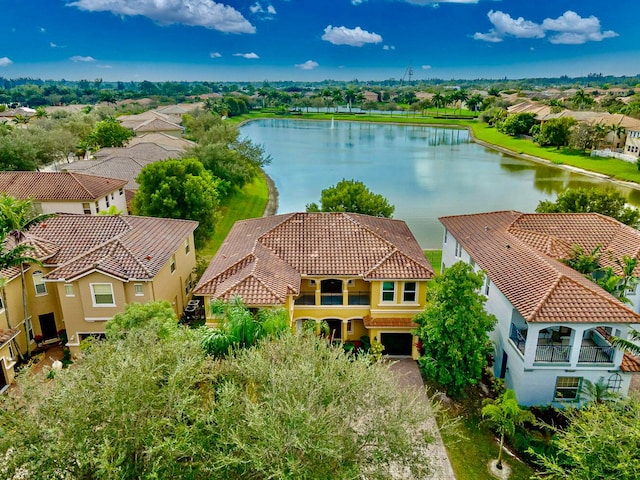 drone / aerial view with a water view