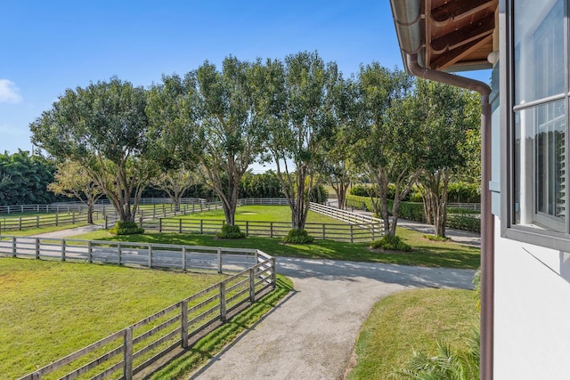 exterior space with a yard and a rural view