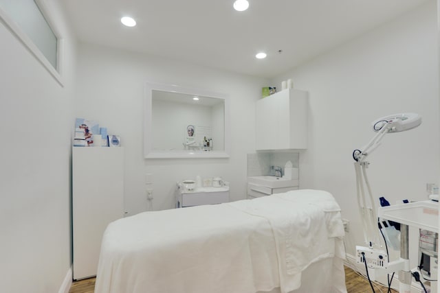 bedroom featuring light hardwood / wood-style floors