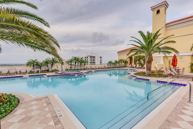 view of swimming pool featuring a patio area