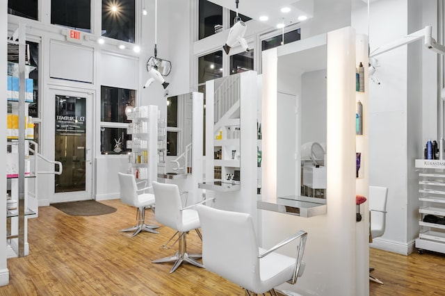 interior space with a high ceiling and light wood-type flooring