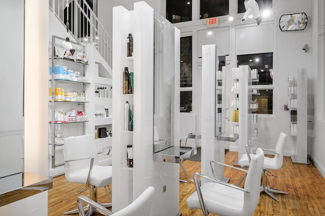 interior space with a shower and wood-type flooring