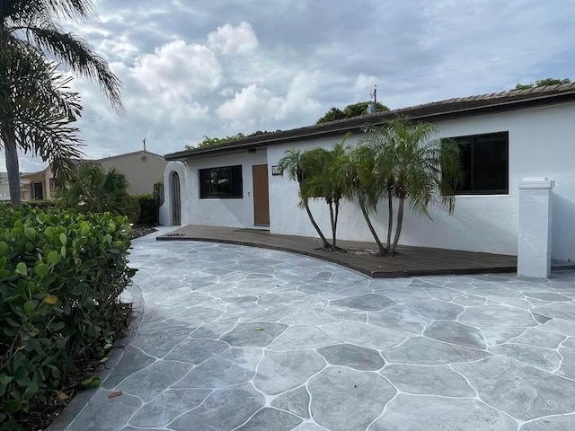 view of front of home with a patio area