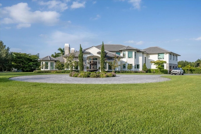 view of front of house with a front lawn