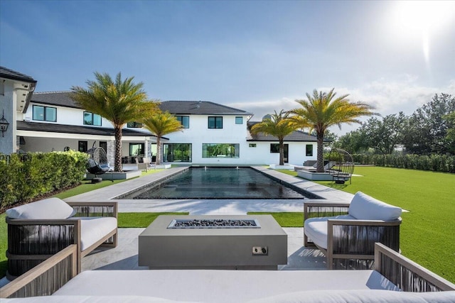 exterior space with an outdoor hangout area, a yard, and a patio area