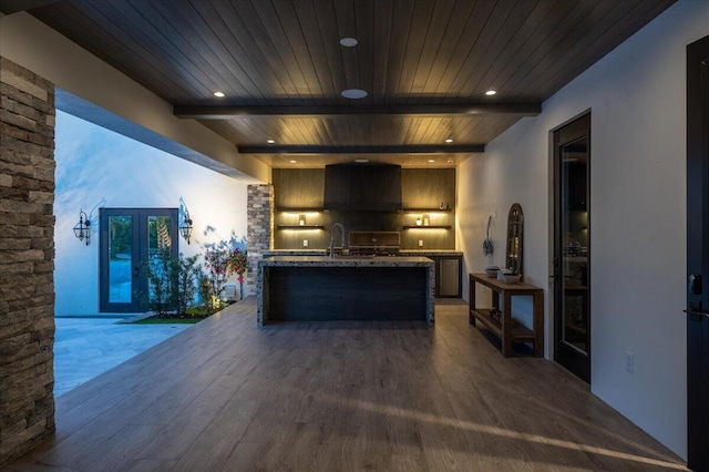 interior space with french doors and sink