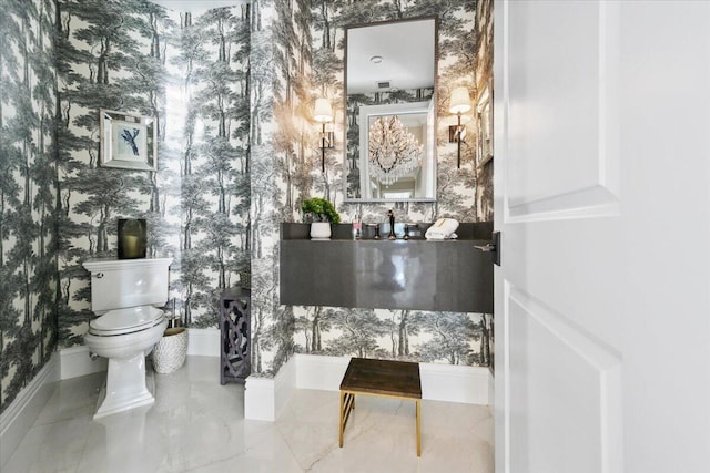 bathroom featuring tile floors and toilet