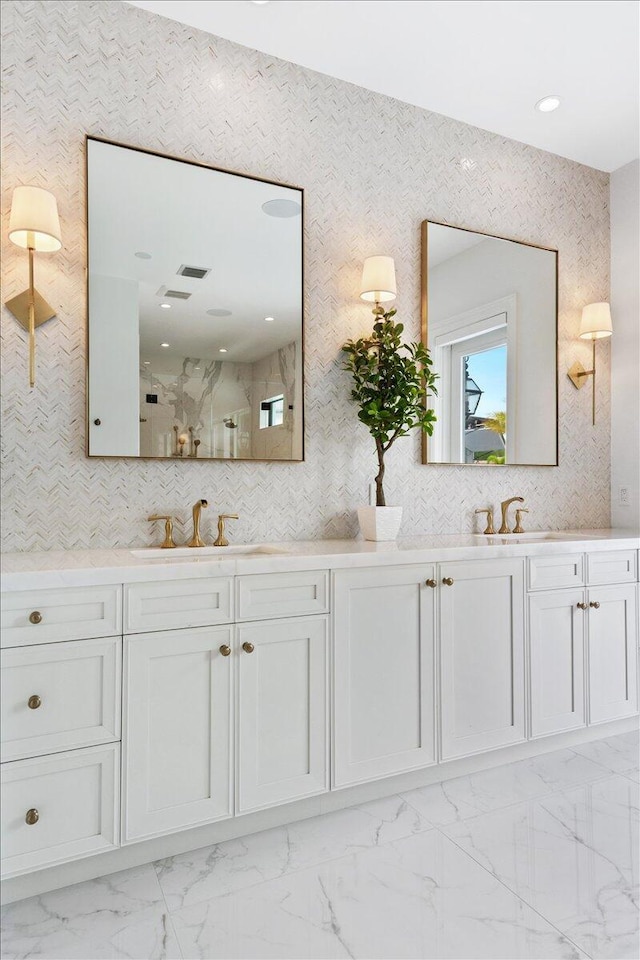 bathroom with double sink, tile flooring, oversized vanity, and tasteful backsplash