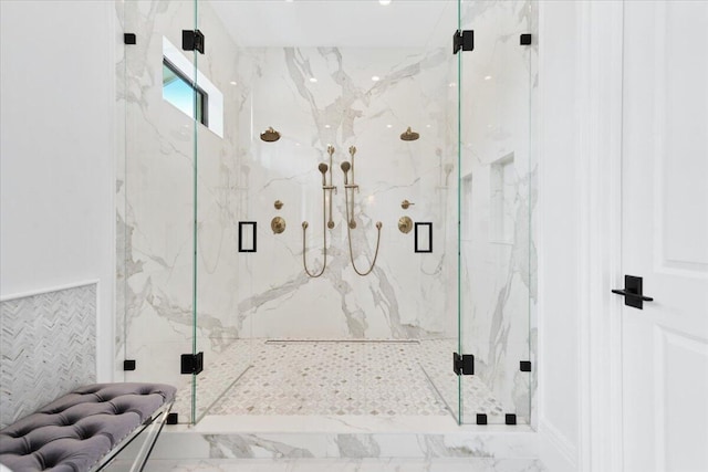 bathroom featuring tile floors and a shower with shower door