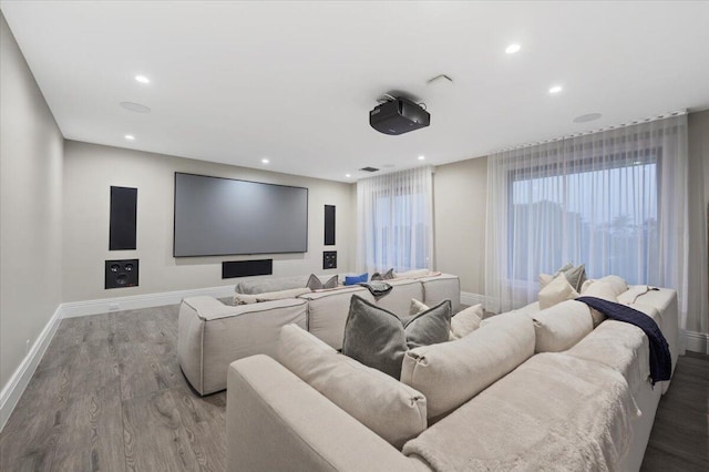 home theater featuring hardwood / wood-style floors