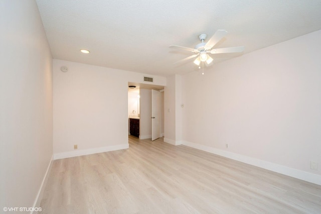 unfurnished room with light hardwood / wood-style floors and ceiling fan