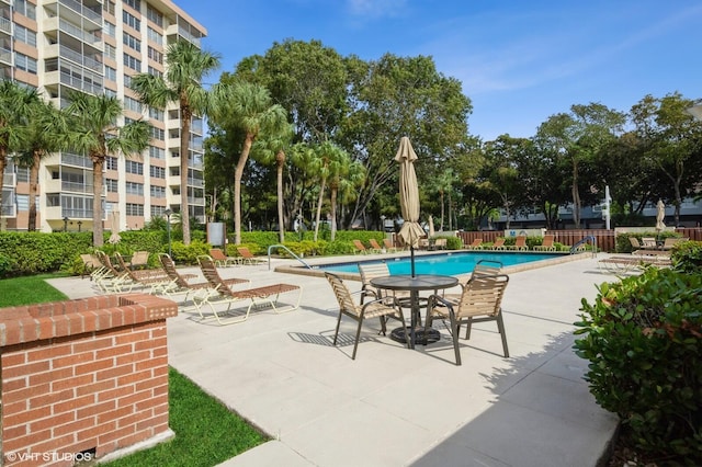 view of pool featuring a patio