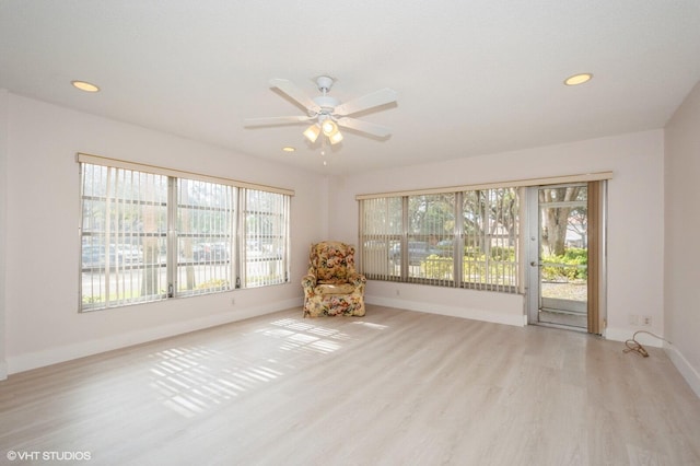 unfurnished room with light hardwood / wood-style floors and ceiling fan