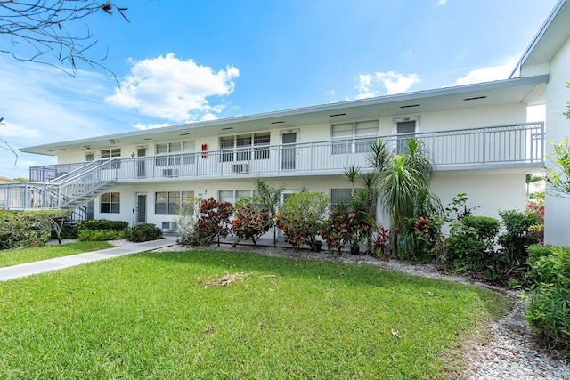 view of property with a front yard