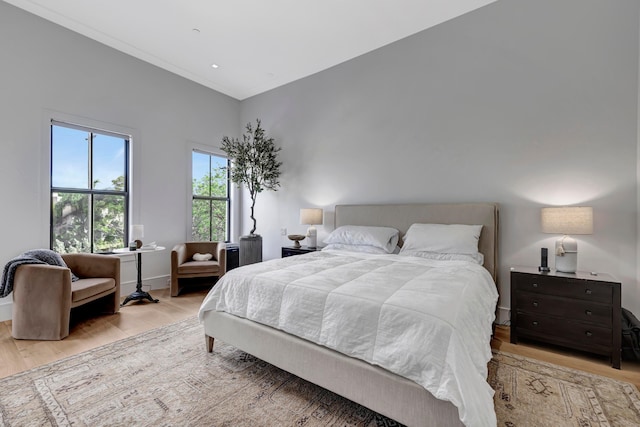 bedroom with light wood-type flooring