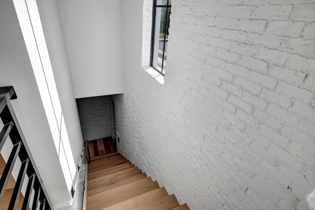 stairway featuring light hardwood / wood-style flooring