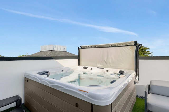 view of patio / terrace featuring a hot tub