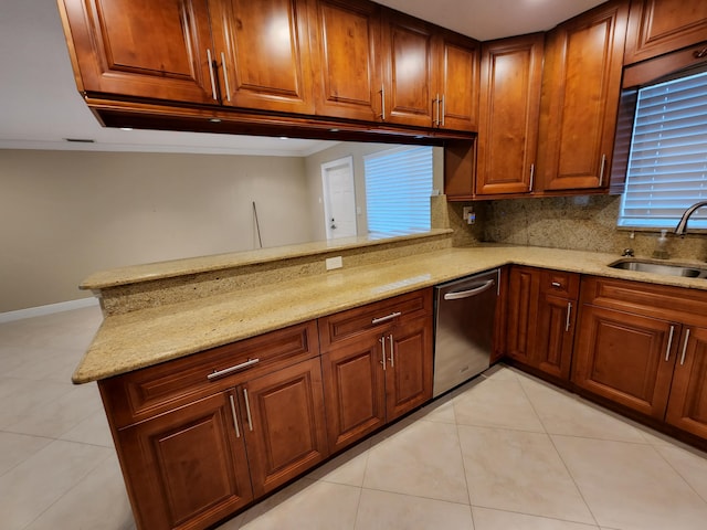 kitchen with sink, light tile floors, dishwasher, and light stone counters