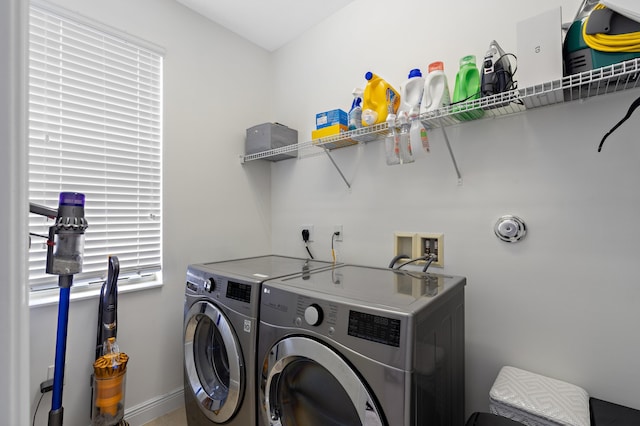 laundry room with hookup for an electric dryer, washing machine and clothes dryer, and hookup for a washing machine