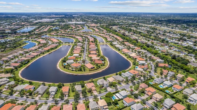 drone / aerial view with a water view