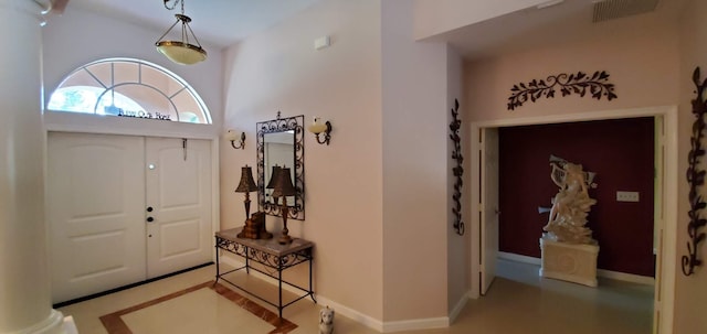 entryway featuring ornate columns