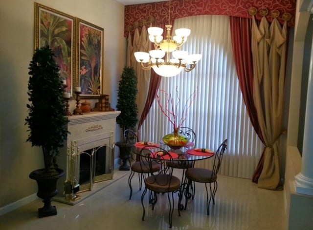 dining room with a notable chandelier