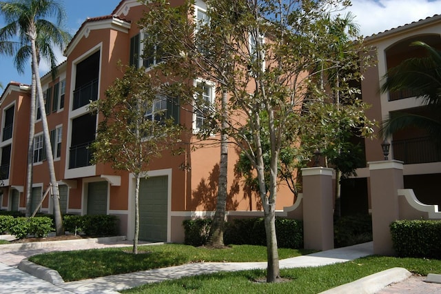 view of building exterior with a garage