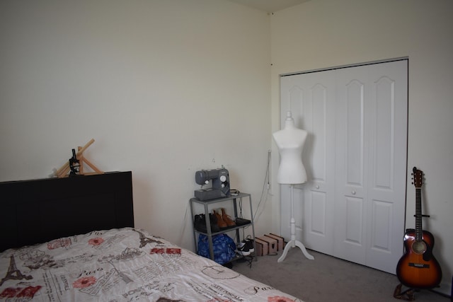 bedroom with carpet floors and a closet